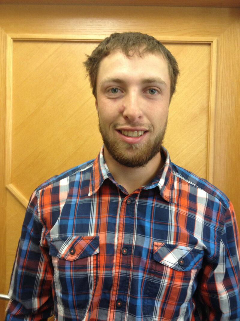 Asslaber Franz-Josef in rot-blauem Hemd.